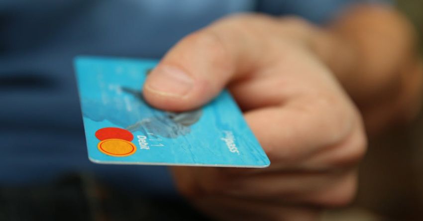 Customers - Person Holding Debit Card